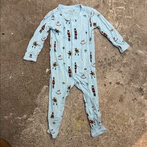 Kyte BABY Light Blue Nutcracker & Toy Print Footed One-Piece